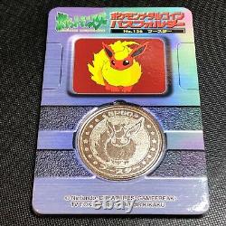 Pokemon Vintage Meiji Dairy Metal Medal No. 136 Flareon with Rare Folder #0306