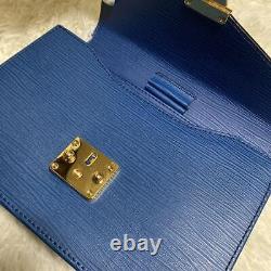 VERSACE Clutch Bag Vintage Rare Sunburst Metal Fittings Gold Blue from japan