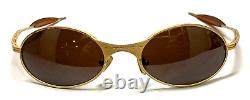 Vintage OAKLEY T-WIRE 1.0 Gold Metal Titanium Wrap Sunglasses Rare